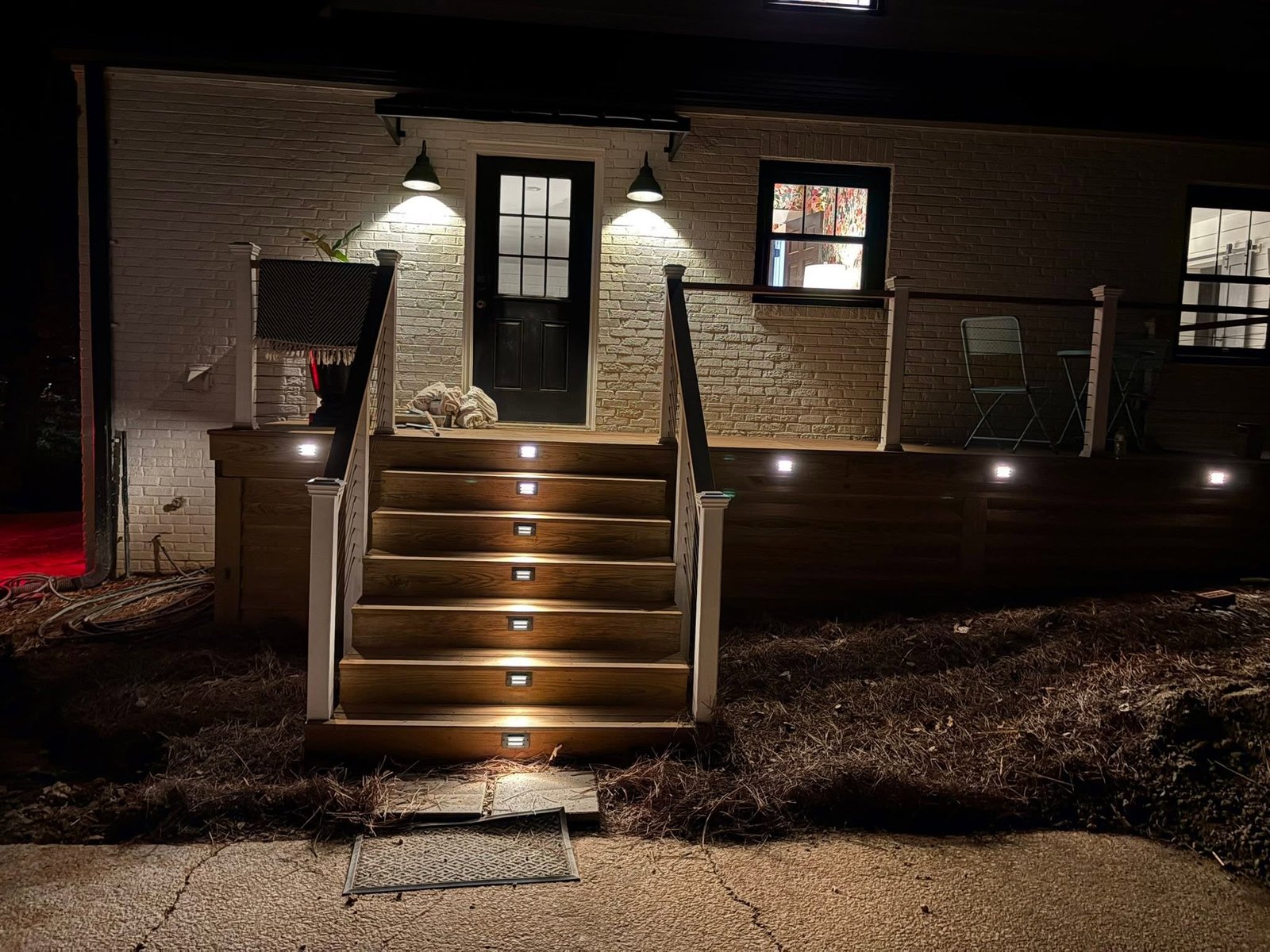 Illuminated front stairs in the evening