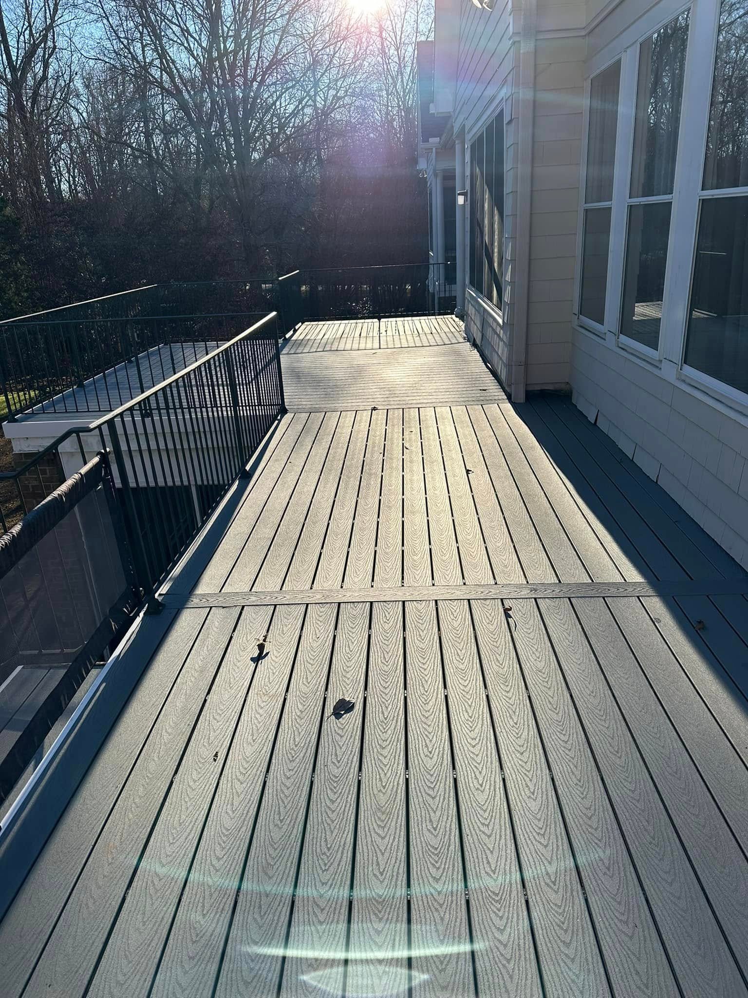 Finished composite deck with white cable railing